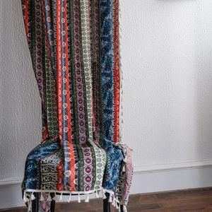Bohemian printed window curtain with colorful geometric patterns and white fringe tassels