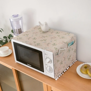 Floral dust cover for microwave with side pockets and elegant fringe tassels