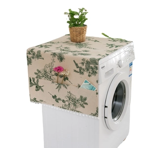 Linen dust cover with green pine print and side storage pockets for washing machines