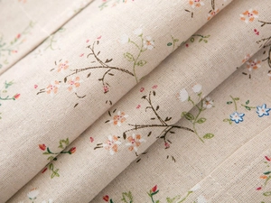 Macro detail of pastoral floral print on textured linen blend fabric for appliance covers