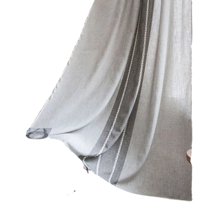 Linen textured striped curtain with rustic tassels in cream and dark grey tones