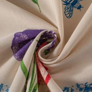 Detail von bedrucktem Stoff mit Tulpenmuster und fester Textur aus Baumwolle und Leinen