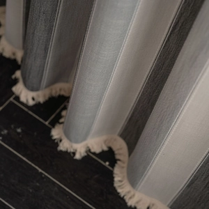 Striped farmhouse window curtain in blue and grey with elegant white tassels for home decor