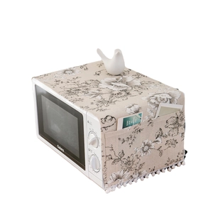 Nordic cotton linen microwave dust cover with black floral pattern and tassel edges