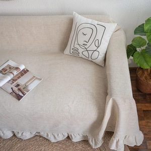 Beige ruffled sofa cover throw with natural linen texture for rustic home decor