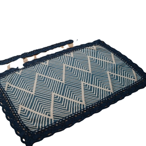 Modern geometric jacquard table runner with blue lace trim and navy chevron patterns