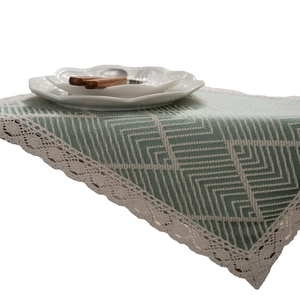 Nordic green geometric jacquard table runner with fringe and elegant white lace edges