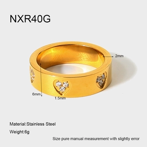 Detail view of 18K gold plated stainless steel ring with zircon hearts and 6mm band width