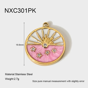 Detailed macro view of 18.6mm stainless steel round pendant with pink enamel and crystals