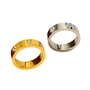 Polished 18K gold and silver stainless steel rings with geometric heart zircon inlay