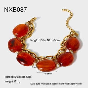 Detail of 18K gold stainless steel chain with amber resin beads, 17.1g weight