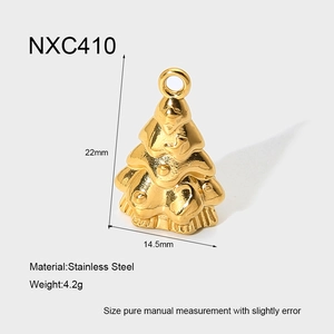 Detail showing 18K gold plated stainless steel Christmas tree pendant size 22mm x 14.5mm