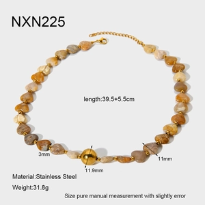 Detail of beaded heart stone necklace with stainless steel lobster clasp and extension chain