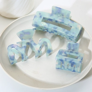 Set di 3 mollette per capelli in acetato marmorizzato blu con design rettangolari e ondulati