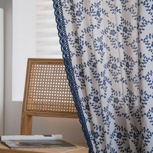 Floral print semi-sheer kitchen curtain with blue lace trim in rustic cotton linen style
