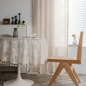 Rideaux en dentelle au crochet beige avec motifs géométriques et franges style rétro