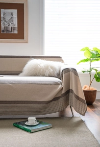 Detail showing high-quality texture and stripe pattern of the woven sofa cover