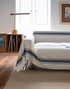 Close-up of navy striped sofa throw blanket with high-quality linen cotton texture