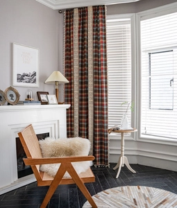 Detail of American retro plaid curtains with lace splicing and beige tassel fringe