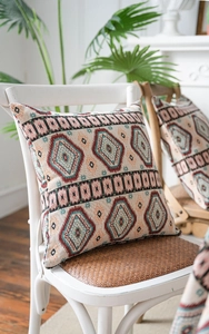 Detailed view of heavy jacquard weave fabric on a geometric pattern cushion cover