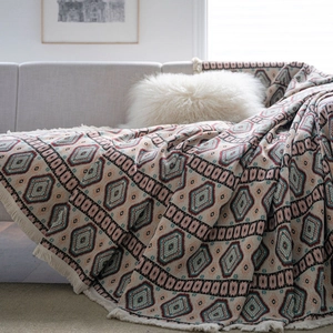 Bohemian geometric jacquard sofa throw blanket with decorative fringe edges in retro style