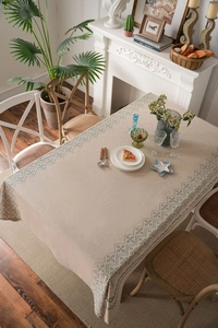 Detailed view of the thick cotton-linen fabric with blue geometric patterns and drape