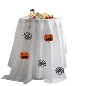 Halloween party tablecloth with orange pumpkin faces and black spider web pattern on white