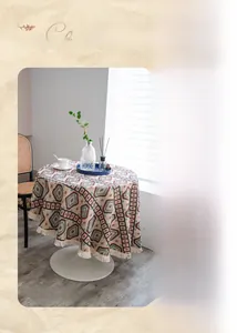 Detailed patchwork jacquard tablecloth with bohemian geometric patterns and white tassels