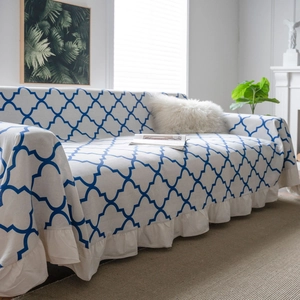 Blue and white clover geometric sofa cover with elegant ruffle hem and cotton linen texture