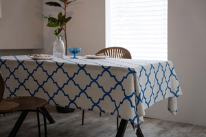 Close-up of blue geometric moroccan pattern on premium cotton linen tablecloth fabric