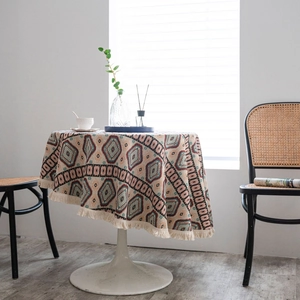 Bohemian round tablecloth with geometric patterns and fringe for dining room decor