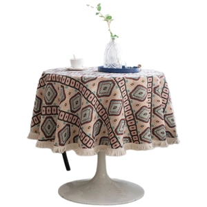 Bohemian round tablecloth with colorful geometric patterns and white fringe edges