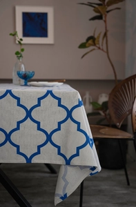 Detail of blue geometric Moroccan pattern on thick cotton linen rectangular tablecloth