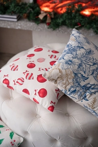 Detail showing high-quality Christmas pillow covers with invisible zipper on an ottoman