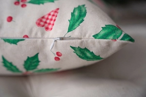 Detailed close-up showing the invisible zipper and textured fabric of the Christmas pillowcase