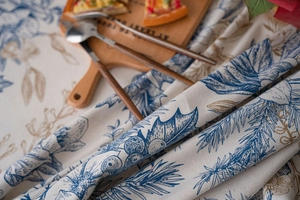 Detailed view of pinecone leaf print tablecloth with high-quality cotton linen texture