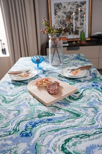 Close-up of thick textured blue and green marble jacquard pattern on high-quality tablecloth