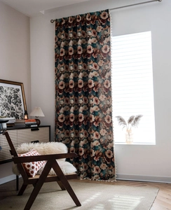 Detail of floral tapestry curtain with retro rose pattern and white fringe tassel trim