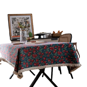 Blue tablecloth with red apple jacquard pattern and elegant cream fringe tassels