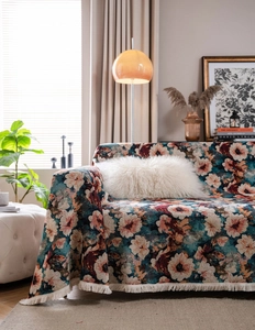 Detailed texture of American rural style floral jacquard sofa cover with fringe edges