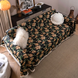 Vintage floral jacquard sofa throw with orange flowers, black chenille and white tassels