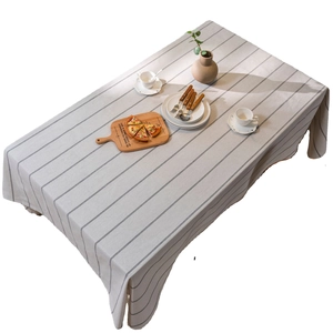 Minimalist rectangular striped linen tablecloth in light grey for elegant dining decor