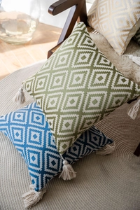 Detail of bohemian geometric jacquard pillow covers with stylish corner tassels
