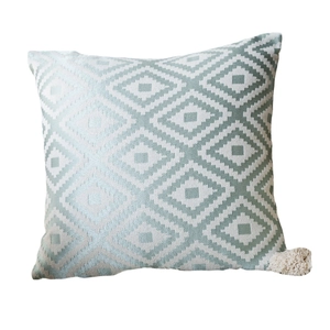 Modern mint green and beige geometric wave jacquard decorative pillow with tassels
