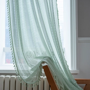 Green crochet lace curtain with hollow floral patterns and fringe tassels for home decor