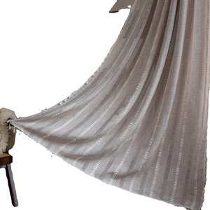 Brown striped curtains with white embroidery and fringe trim for living room decor