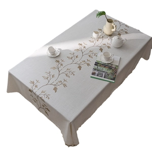 Linen table cloth with elegant brown leaf print and decorative tassel fringe edges