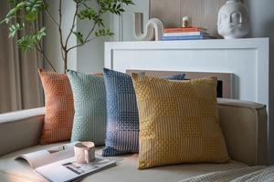 Detailed view of 3D hexagonal textured weave fabric on modern sofa throw pillow covers