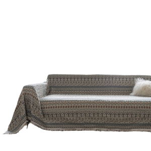 Copridivano boho etnico con motivi geometrici e bordi con frange sottili