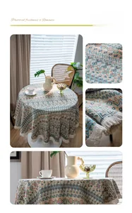 Detail of round tablecloth with geometric patterns and white fringed tassel edges